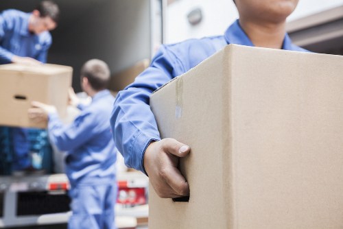 Professional house removalists loading furniture in Charlton