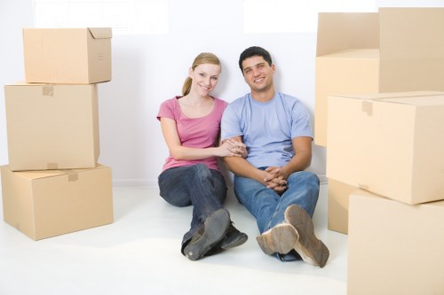 Professional movers packing boxes and furniture in Charlton