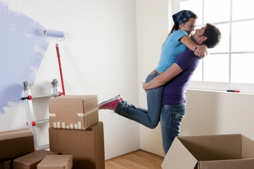 Local Charlton removals service loading household items safely into a van