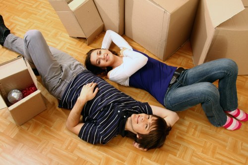 Selection of cardboard boxes, tape, and bubble wrap for packing in Charlton