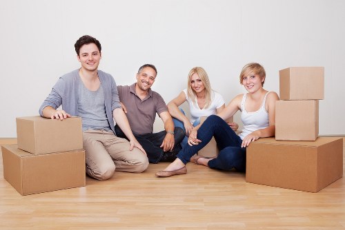 Local van moving boxes and household items in Charlton